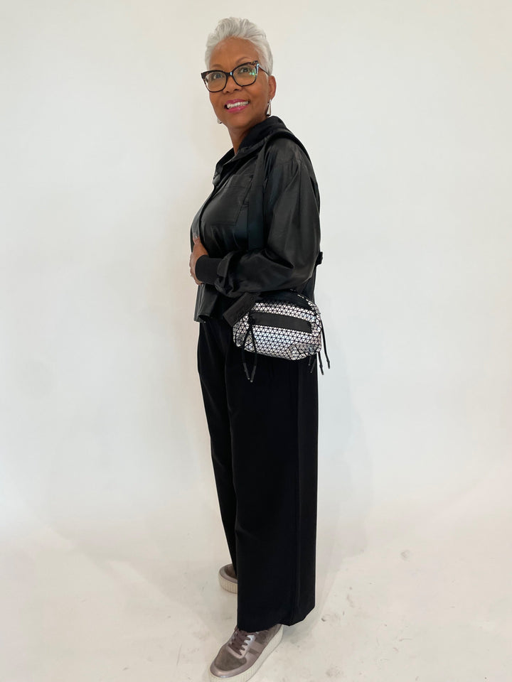 Lola & Sophie Vegan Leather Swing Jacket in Black paired with Lilla P. Wide Leg Pull-On Pants in Black, Daniella Lehavi Dani Bonnie Mini Crossbody Bag in Silver available at Barbara Katz