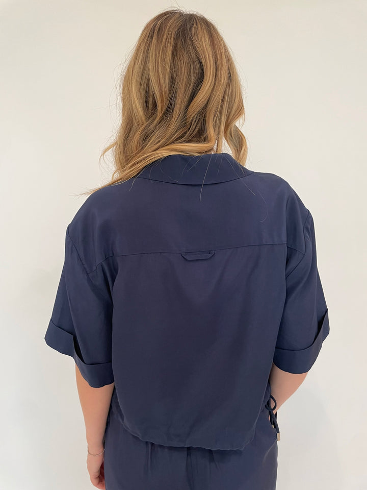 Simkhai Ryett Short Sleeve Cropped Shirt in Midnight available at Barbara Katz