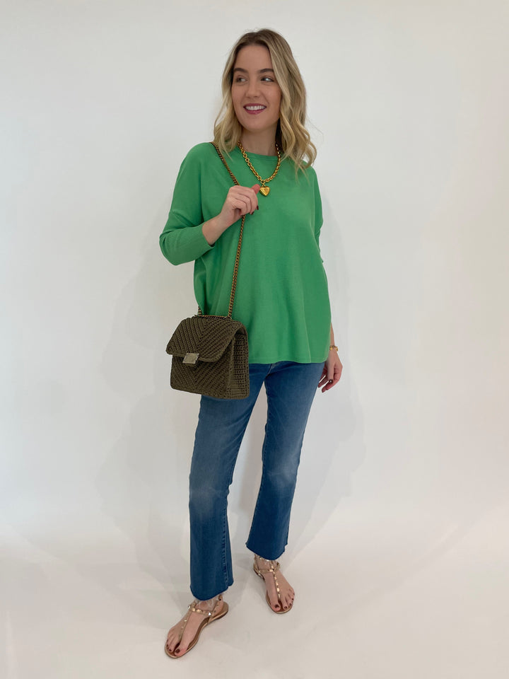 BK Sabrina Boxy Sweater in Island Green paired with Mother The Hustler Ankle Fray Jeans in Grasping At Straws,  Elizabeth Cole Jewelry Mallory Necklace, Noam Hazan Milan Bag in Olive available at Barbara Katz

