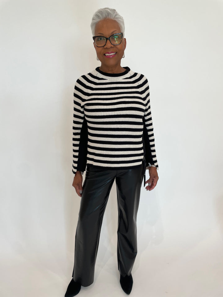 Oui Rubi Stripe Pullover Sweater in Black/Off White paired with Lysse Amara Straight Flare Vegan Leather Pants in Black Wicker, BK Drop Long Post Earrings in Silver available at Barbara Katz