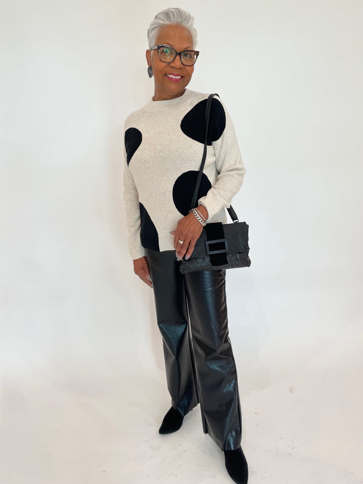 Oui Dannie Dotted Pullover Sweater in Off White/Black paired with Lysse Amara Straight Flare Vegan Leather Pants in Black Wicker, Daniella Lehavi Eva Clutch Bag in Black Croco available at Barbara Katz