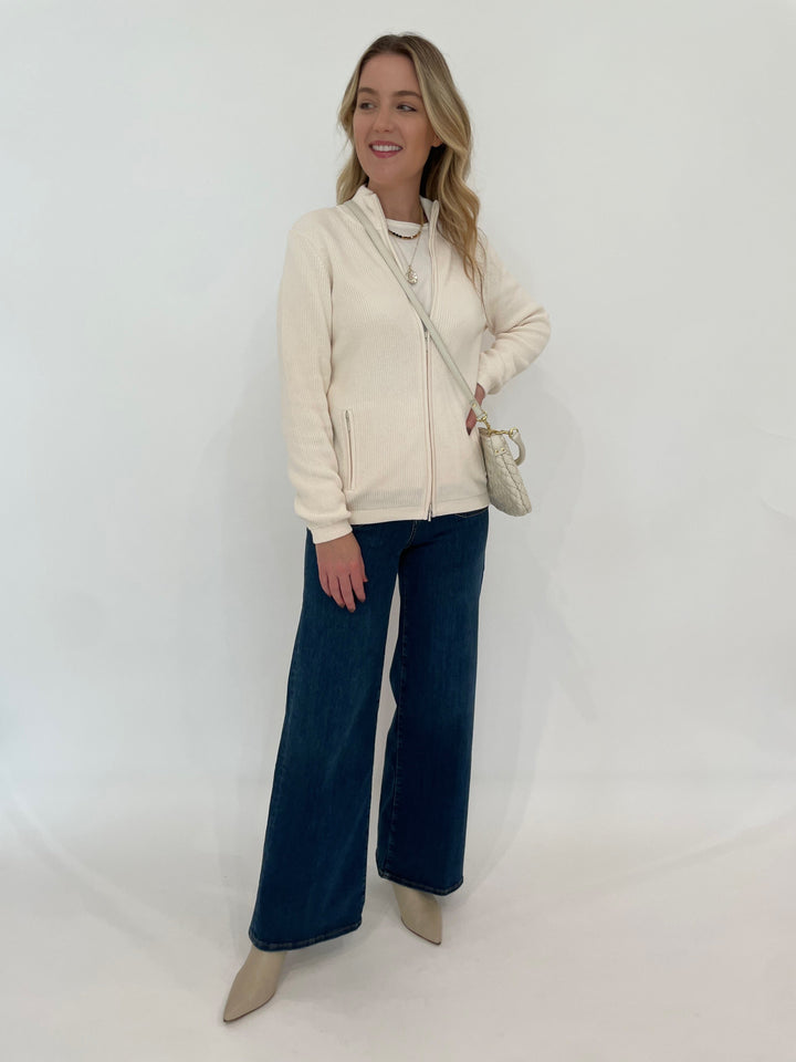 Edinburgh Knitwear Shaker Knit Jacket in White paired with Frame Le Slim Palazzo Bardot Pocket Jeans in Cursive, Melinda Maria Sweet Dreams Necklace and Not Your Basic Graduated Ombre Tennis Necklace 16", Clare V Petit Moyen Messenger in Cream Puff Woven - all available at Barbara Katz