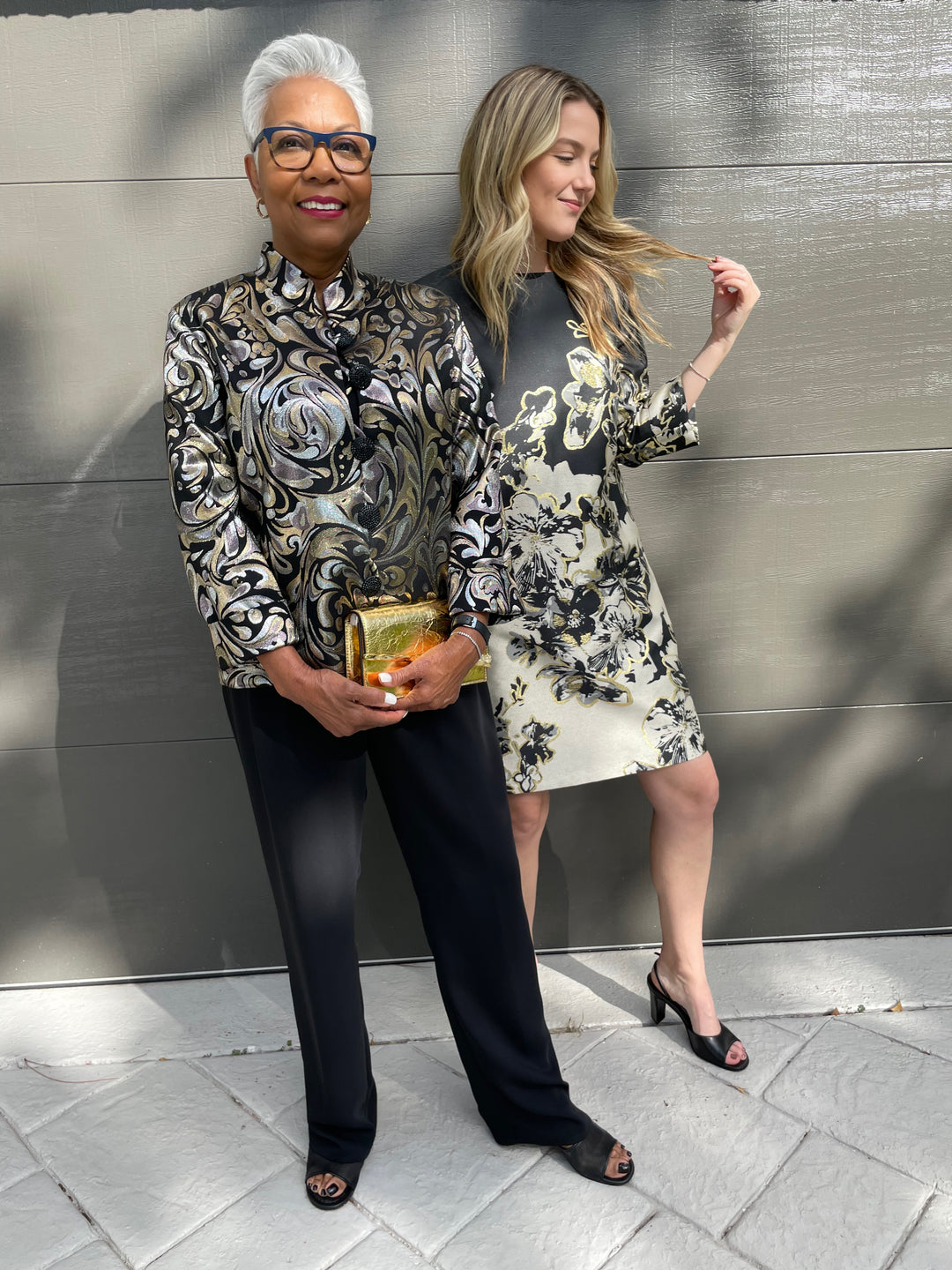 Caroline Rose Midnight Magic Jacquard Jacket paired with Matte Crepe Straight Leg Pant in Black, Alexis Bittar Gold Angular Convertible Crossbody Bag, Caroline Rose Showstopper Jacquard Mini Dress - all available at Barbara Katz