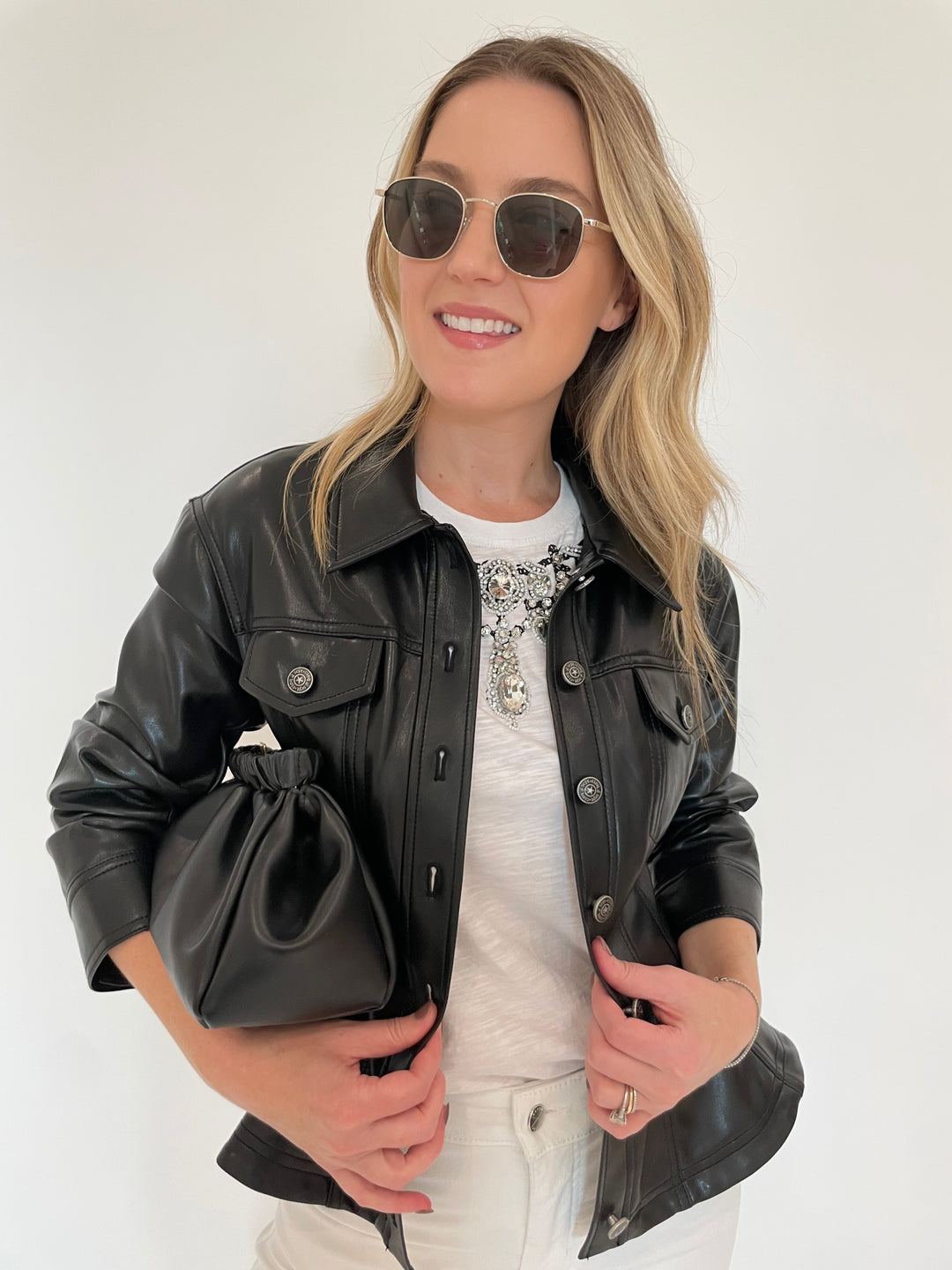 Cinq a Sept Applique Jewelry Tee in White with Gina Vegan Leather Jacket in Black and DeMellier Miami Clutch in Black available at Barbara Katz