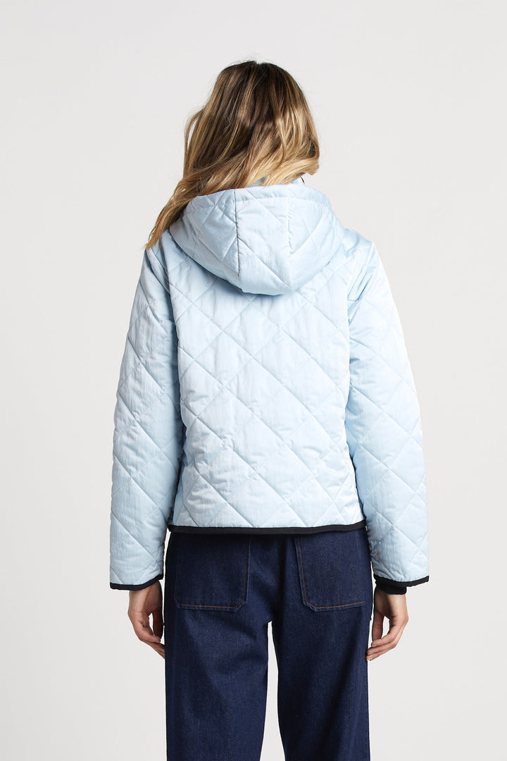 Adroit Atelier Shelby Short Quilted Hooded Jacket in Ice Blue available at Barbara Katz