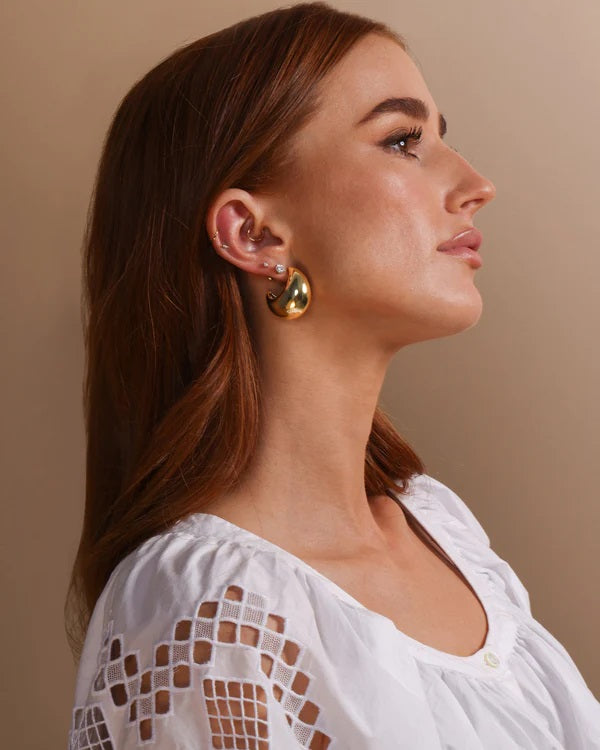 Melinda Maria 'She's So Smooth' Mama Teardrop Hoop Earrings in Gold available at Barbara Katz