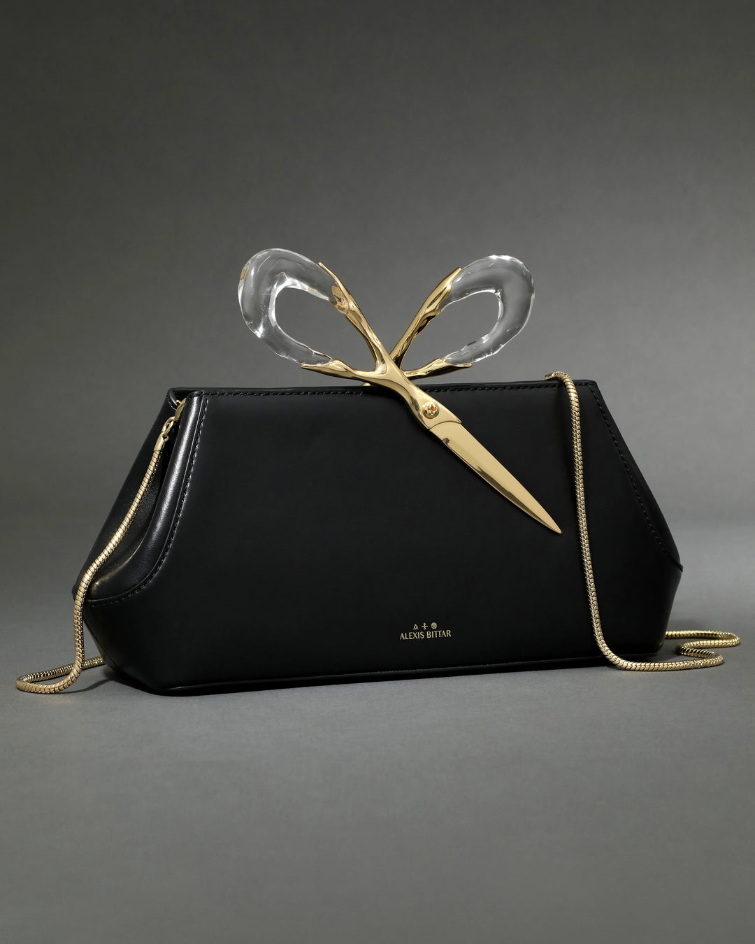 Alexis Bittar The Scissor Clutch Bag in Black Leather with Gold strap available at Barbara Katz