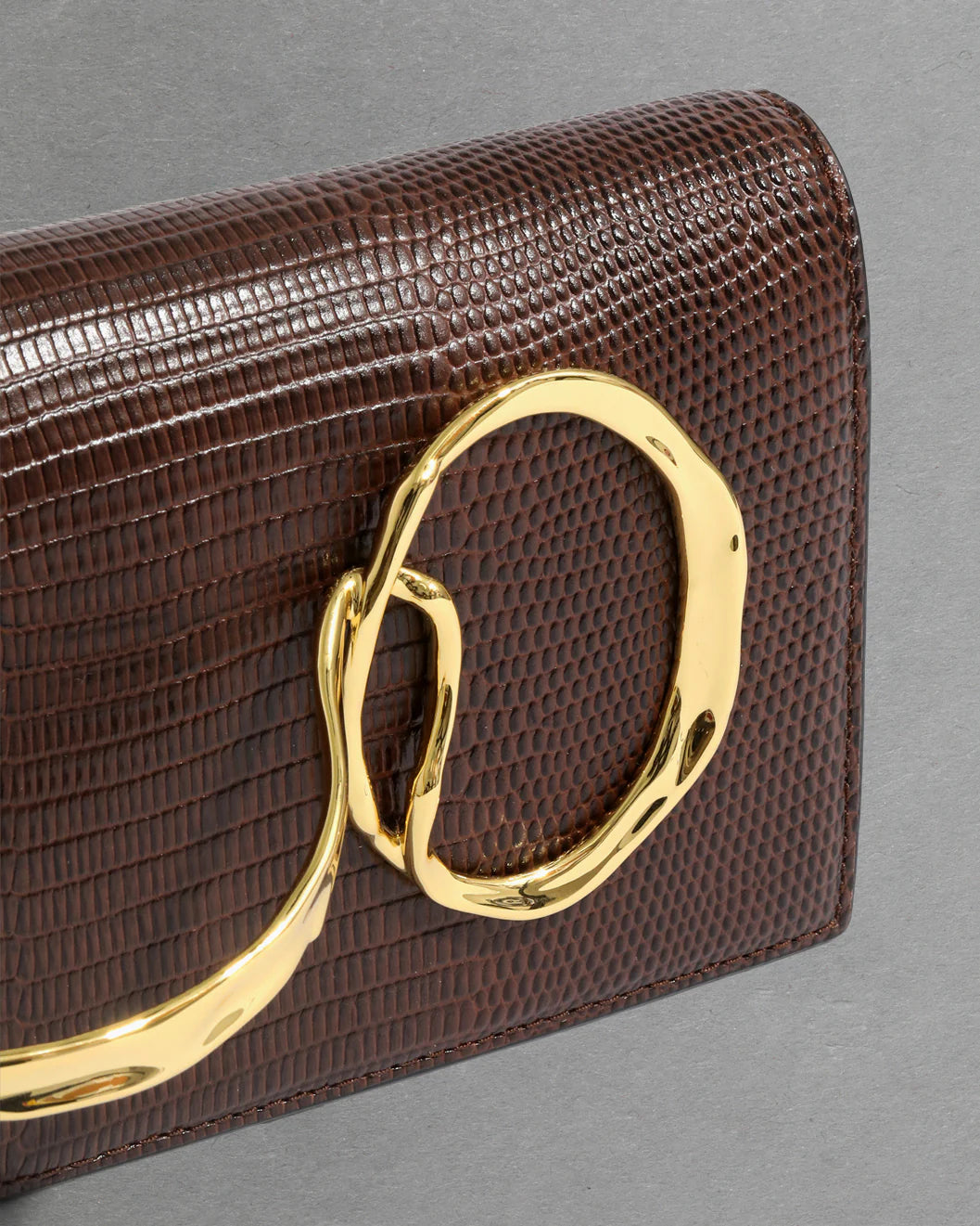 Alexis Bittar Twisted Gold Side Handle Clutch Purse in Chocolate available at Barbara Katz