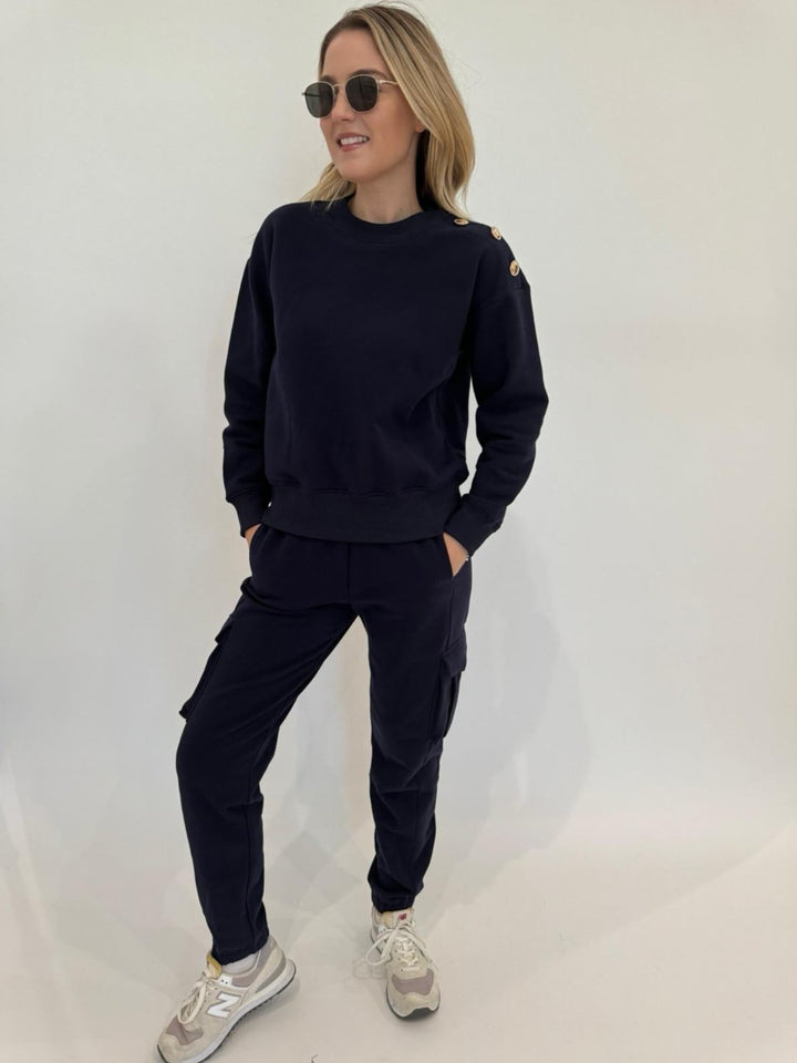 Generation Love Cambria Sweatshirt in French Navy paired with matching Chandra Fleece Sweatpants, Le Specs Neptune Deux Sunglasses - all available at Barbara Katz