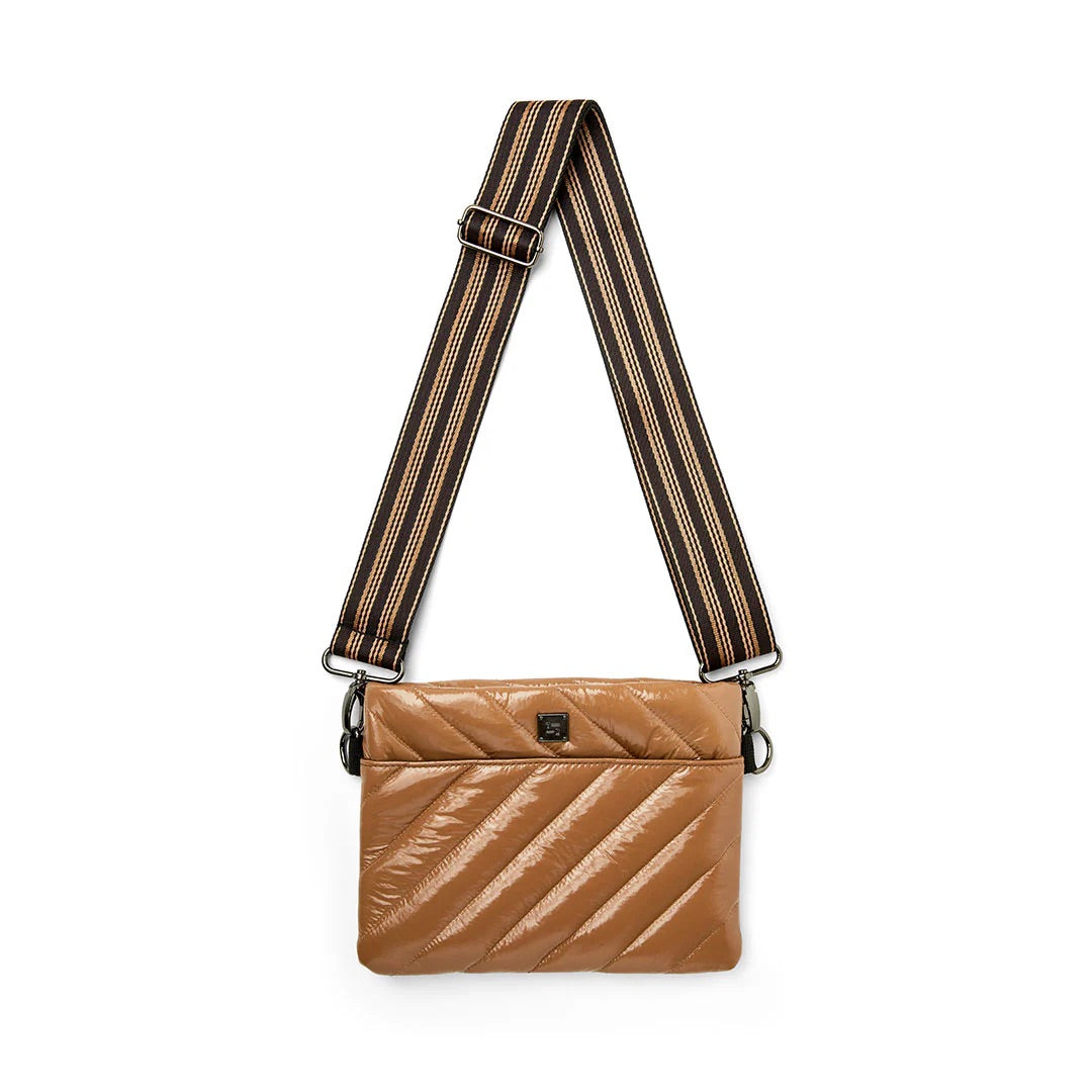 Think Royln Diagonal Bum Bag 2.0 in Glossy Caramel with adjustable straps