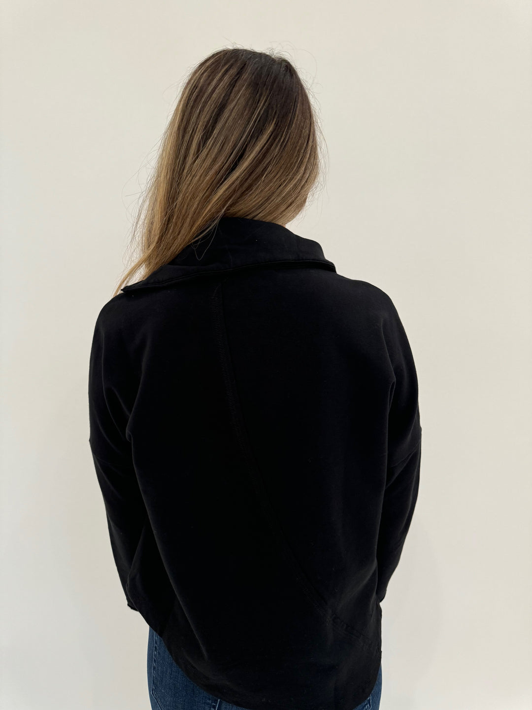 LIV by Habitat Zip Seam Pullover Sweater in Black available at Barbara Katz