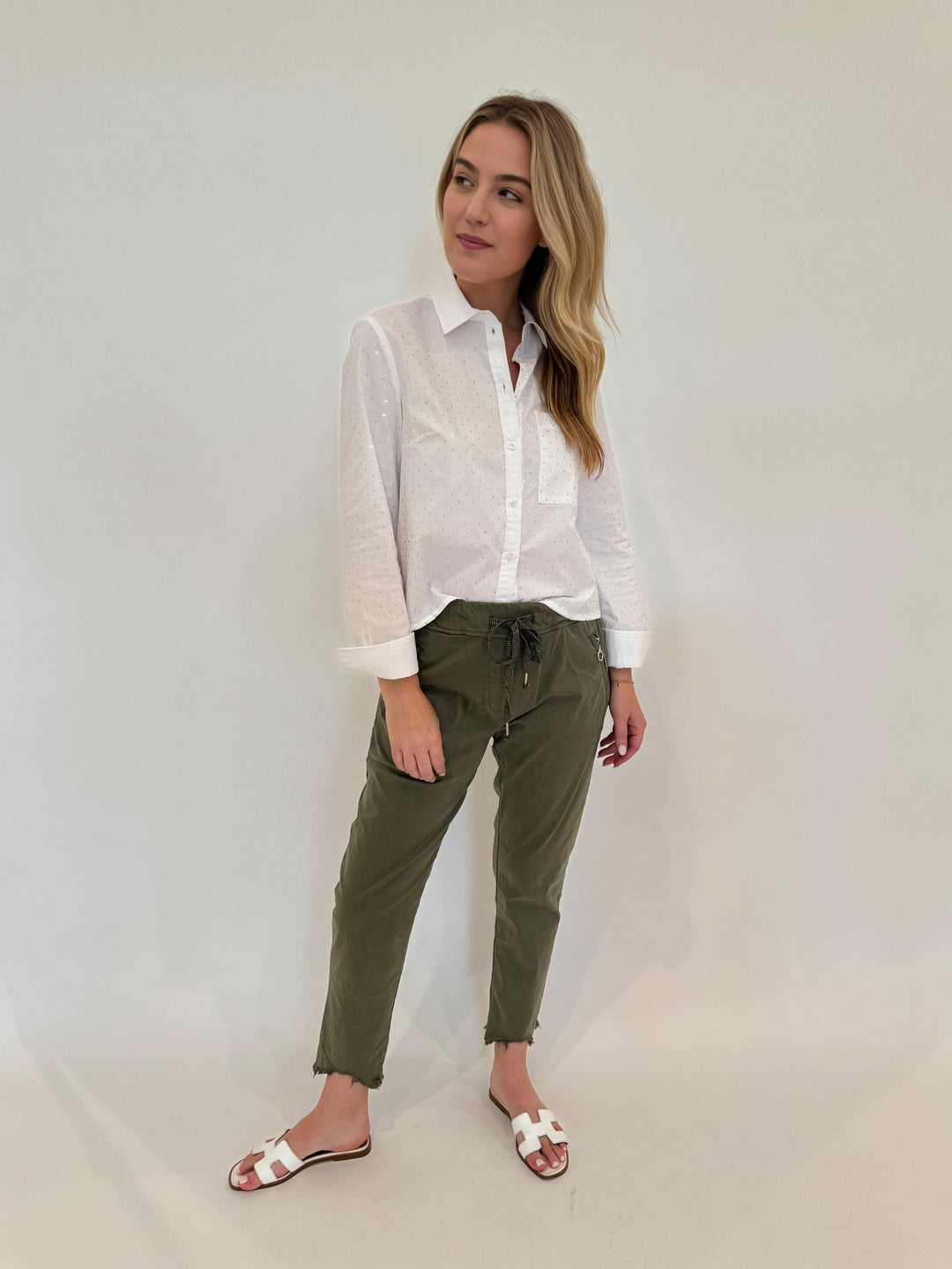 Oui Nova Shirt with Studs paired with BK Charlie Zip Pocket Crinkle Jogger With Raw Hem in Army Green available at Barbara Katz