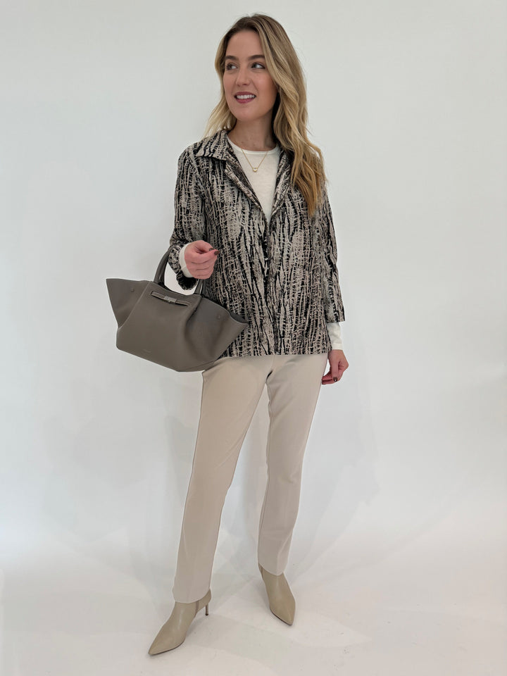 Caroline Rose Abstract Jacket in Multi/Black paired with Peace of Cloth Annie Paramount Knit Pants in Buff, and  DeMellier Stone Grey The Midi New York Tote Bag available at Barbara Katz