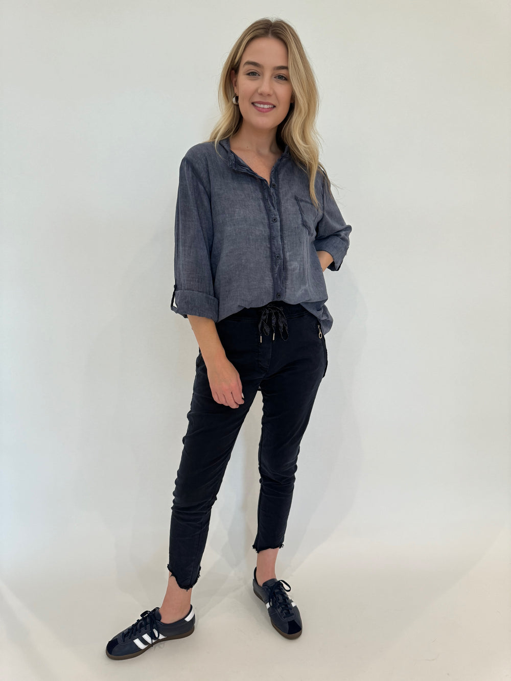 BK Heidi Solid Button Down Cotton Shirt in Navy paired with BK Charlie Zip Pocket Crinkle Jogger With Raw Hem in Navy available at Barbara Katz