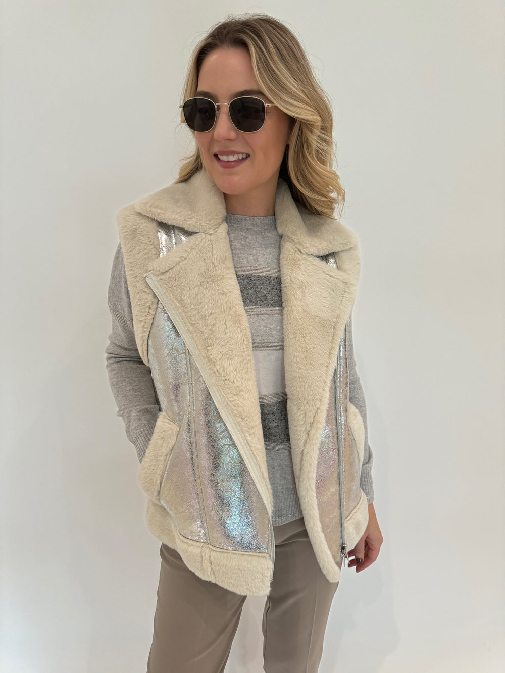 D.Exterior Sherpa Trim Metallic Vest in Onice with Multi Stripe Crew Sweater in Cenere underneath, paired with EW Straight Leg Trouser in Visone, Le Specs Neptune Deux Sunglasses - all available at Barbara Katz