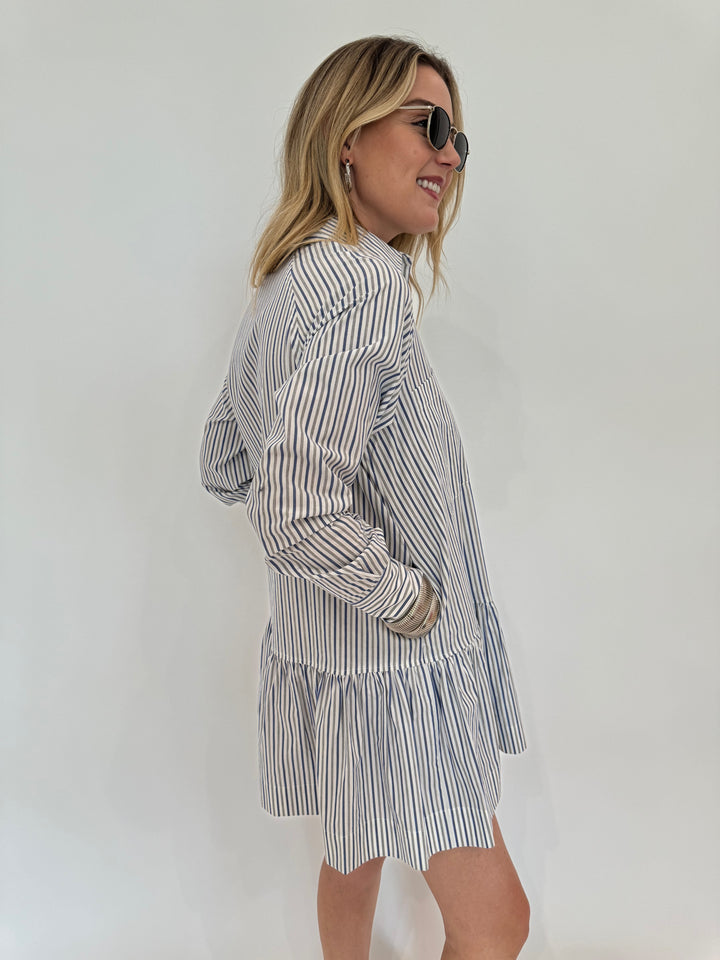 Simkhai Polina Shirt Mini Dress - Cool Gray Stripe with Le Specs Neptune Deux Sunglasses, Alexis Bittar Brut Tube Hoop Earrings in Silver, BK Silver Cobra Cuff and Bracelet - all available at Barbara Katz