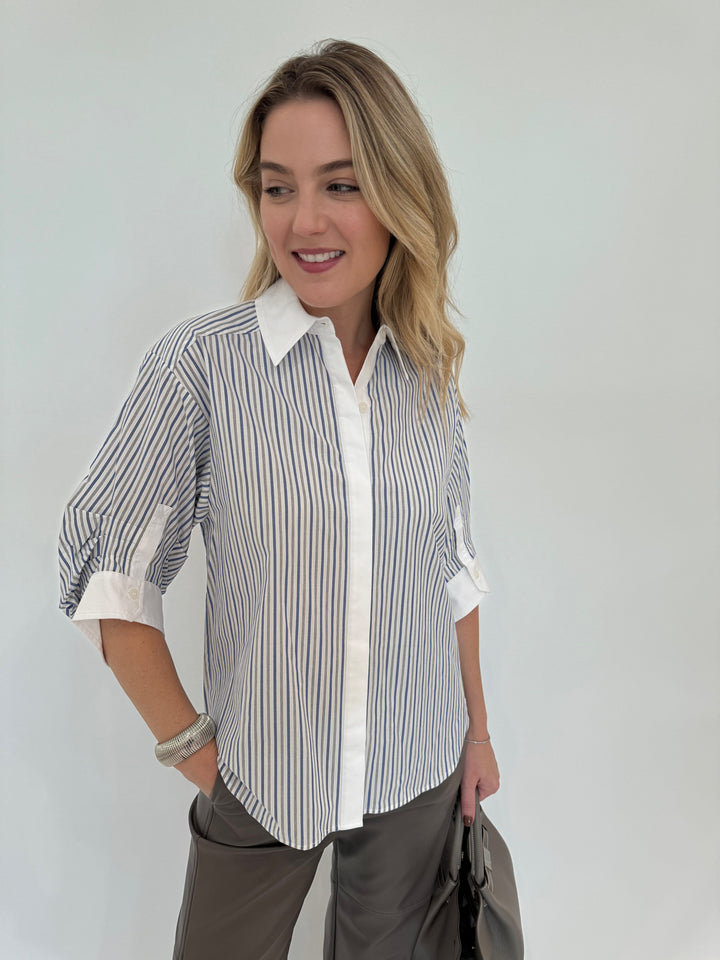 Simkhai Gemma Three-Quarter Sleeve Shirt in Cool Gray Stripe paired with Max Mara Struzzo Vegan Leather Pants in Hazelnut available at Barbara Katz