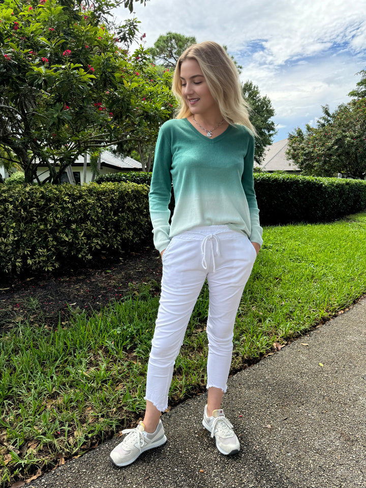 Elliott Lauren Lina Ombre Long Sleeve Sweater in Sea Salt paired with Barbara Katz Distressed Fringe Hem Crinkle Jogger in White available at barbarakatzshop.com