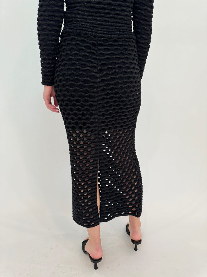 Maria Pavan Lyra Wave Sequin Midi Skirt in Black with Back Slit available at Barbara Katz