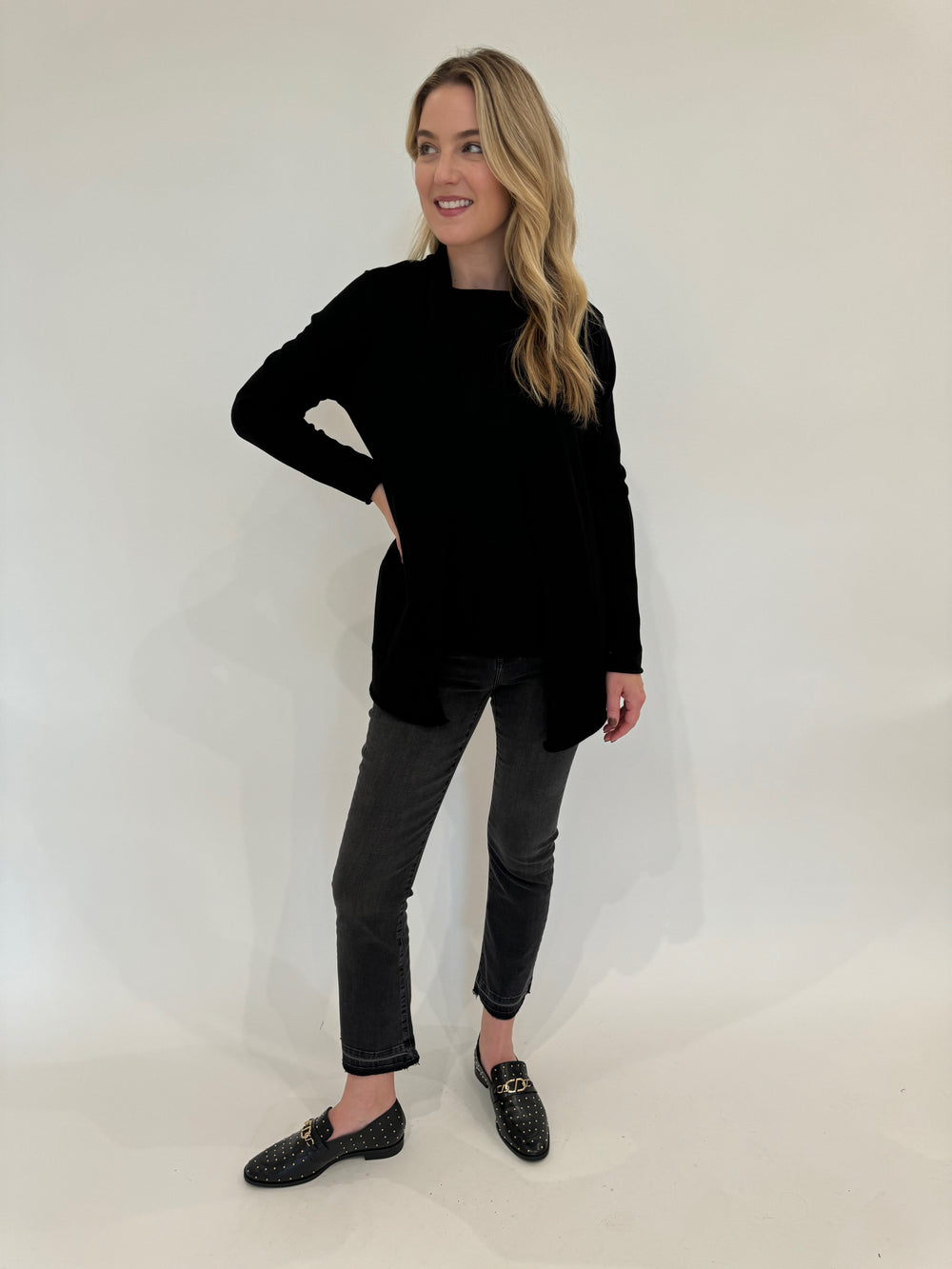 BK Stella Roll Crew Neck Sweater and Olivia Long Open Cardigan in Black paired with Elliott Lauren Bootcut Jeans with Shadow Hem
in Washed Black available at Barbara Katz