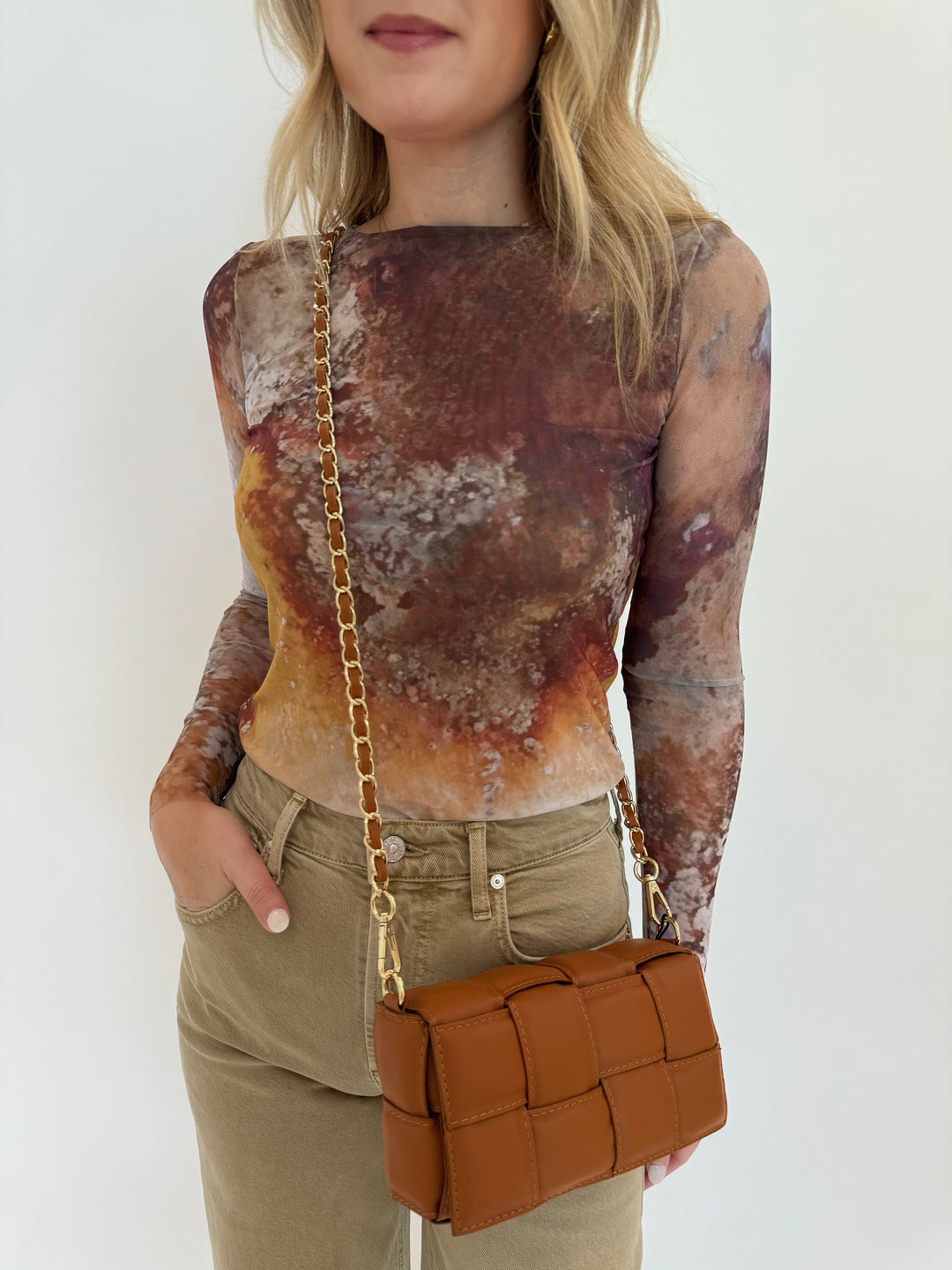 AMB Florence Double Sheer Top in Cavely paired with Citizens of Humanity Lyra Crop Wide Leg Jeans in Porcini, and BK Square Weave Leather Crossbody Bag in Camel, all available on barbarakatzshop.com