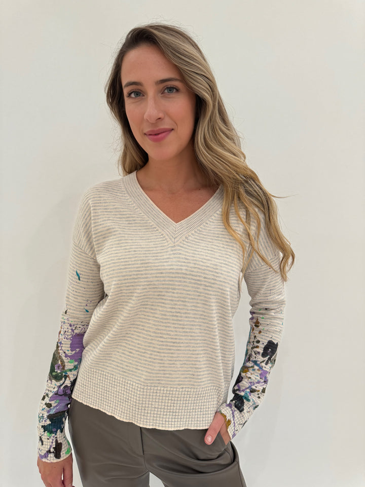 Lisa Todd Between The Lines Paint Splatter V-Neck Sweater in Sheepskin/Platinum available at Barbara Katz