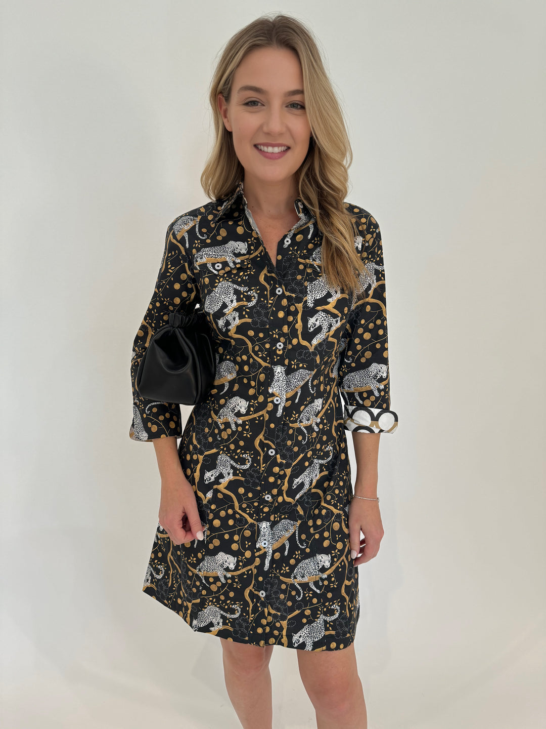 Dizzy-Lizzie Sag Harbor Shirt Dress in Black with Sleeping Cheetahs Print, shown with DeMellier Miami Clutch in Black Smooth available at Barbara Katz