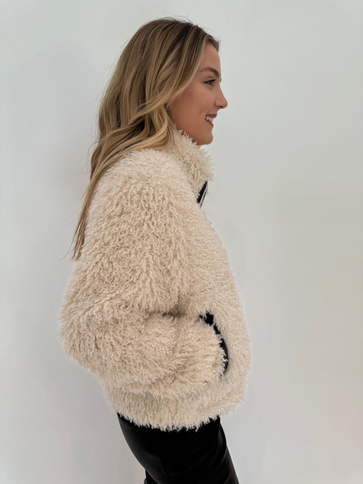 Adroit Atelier Carrie Short Mongolian Faux Fur Coat in Ivory available at Barbara Katz