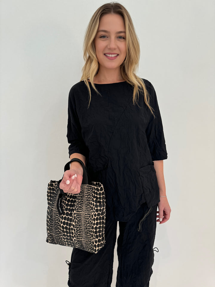 Beau Jours Thea Top in Black paired with Adrina Pants in Black, Daniella Lehavi Tokyo Small Shopper Bag in Cream