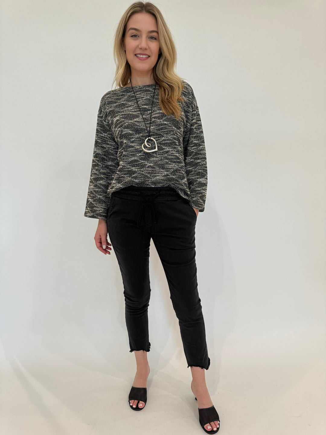 BK Katy Textured Long Sleeve Lounge Top in Black/Cream paired with Distressed Fringe Hem Crinkle Jogger in Black available at Barbara Katz