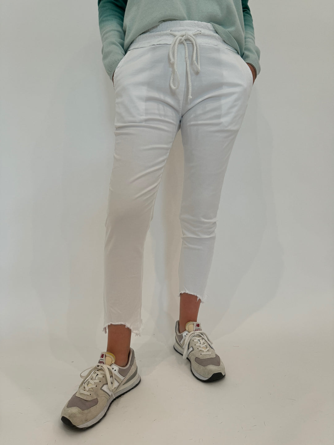 BK Kylie Distressed Fringe Hem Crinkle Jogger in White available at Barbara Katz