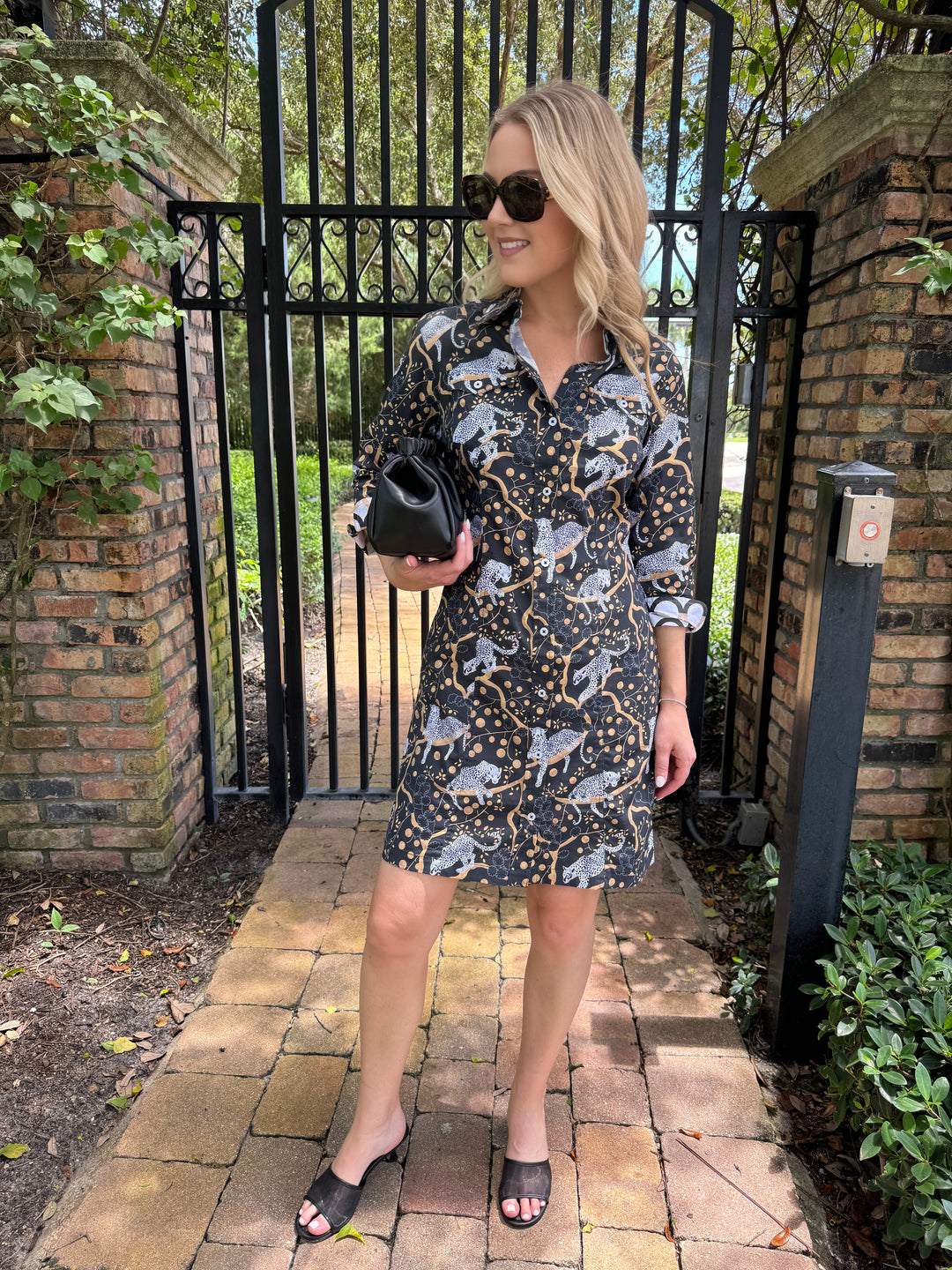 Dizzy-Lizzie Sag Harbor Shirt Dress in Black with Sleeping Cheetahs Print, shown with DeMellier Miami Clutch in Black Smooth available at Barbara Katz