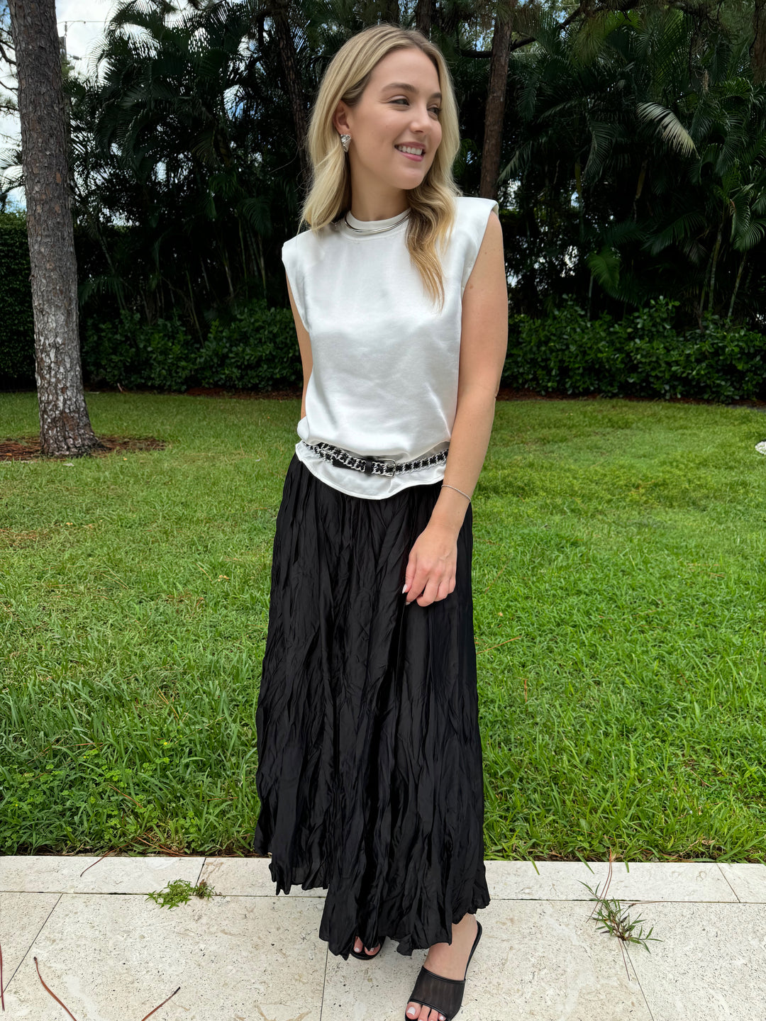 Melissa Nepton Helora Satin Top in Off White paired with BK Maddie Crinkle Maxi Skirt in Black available at Barbara Katz