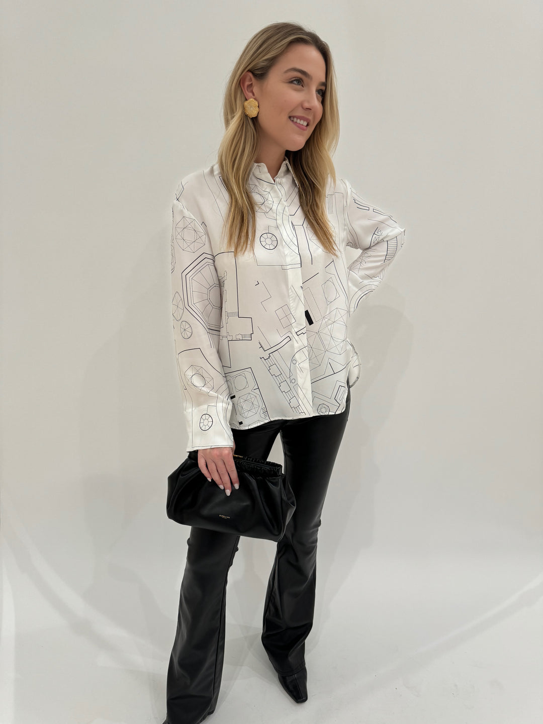 Max Mara Weekend Urna Silk Printed Shirt in White paired with Peace of Cloth Jilian Faux Leather Slim Jeans in Black  available at Barbara Katz