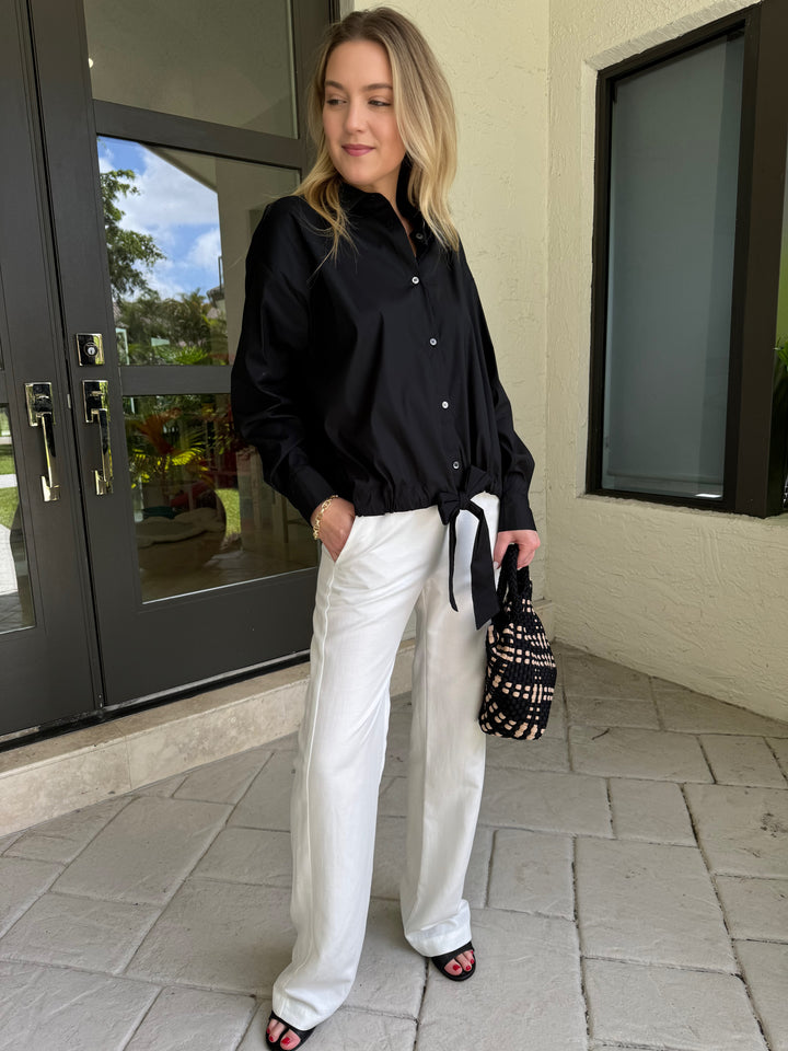 Repeat Tie Waistband Long Sleeve Blouse in Black paired with Enza Costa Twill Everywhere Pant in Off White and Sol and Selene Sky's The Limit Small Bag in Black/Nude