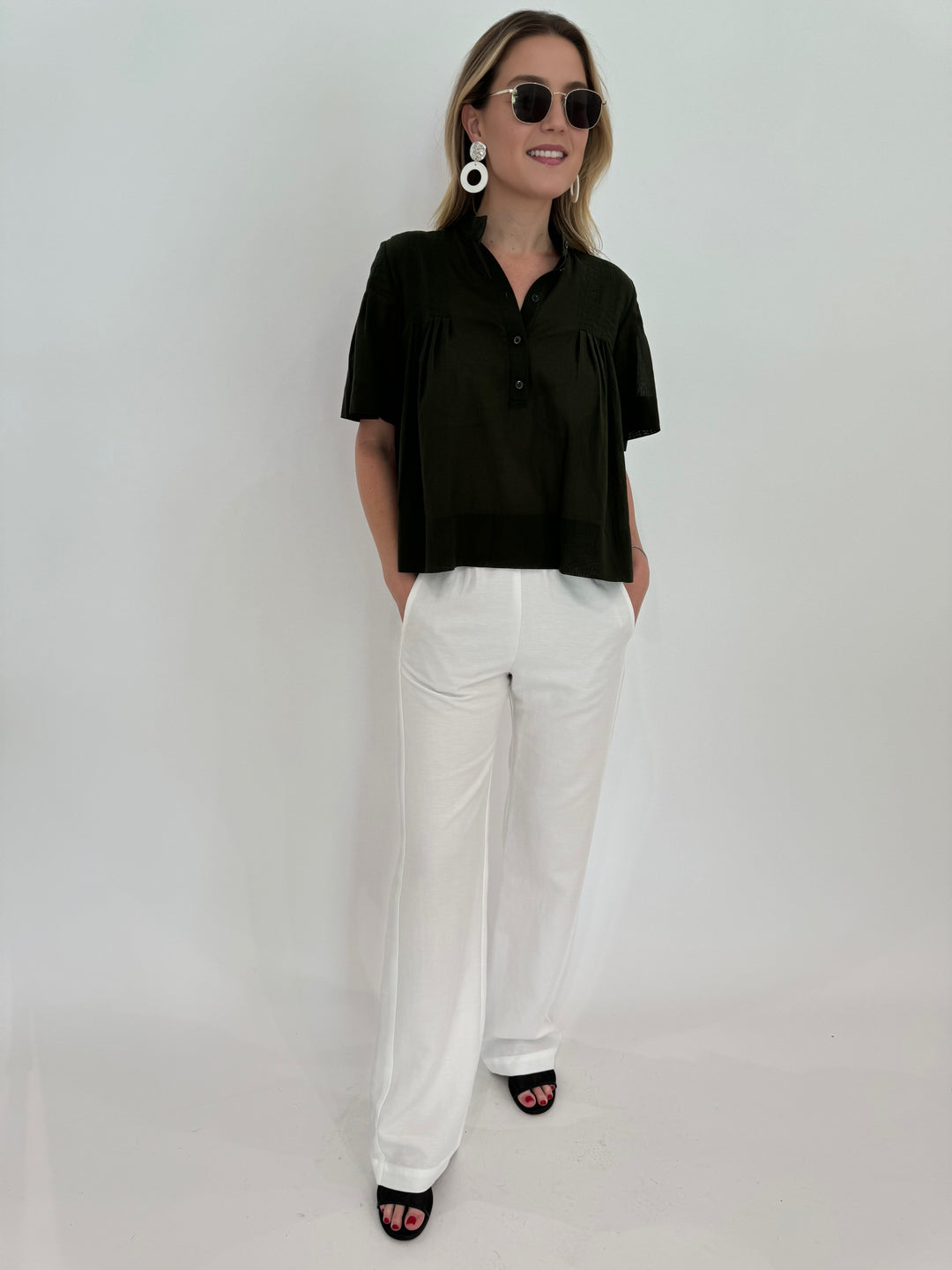 rame Pleated Button-Up Blouse in Military paired with Enza Costa Twill Everywhere Pant in Off White