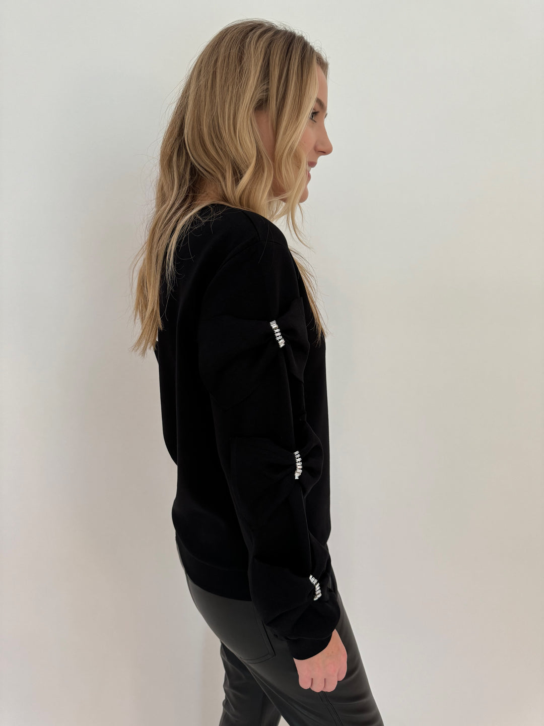 Leo & Ugo Bow Long Sleeve Sweatshirt in Black available at Barbara Katz