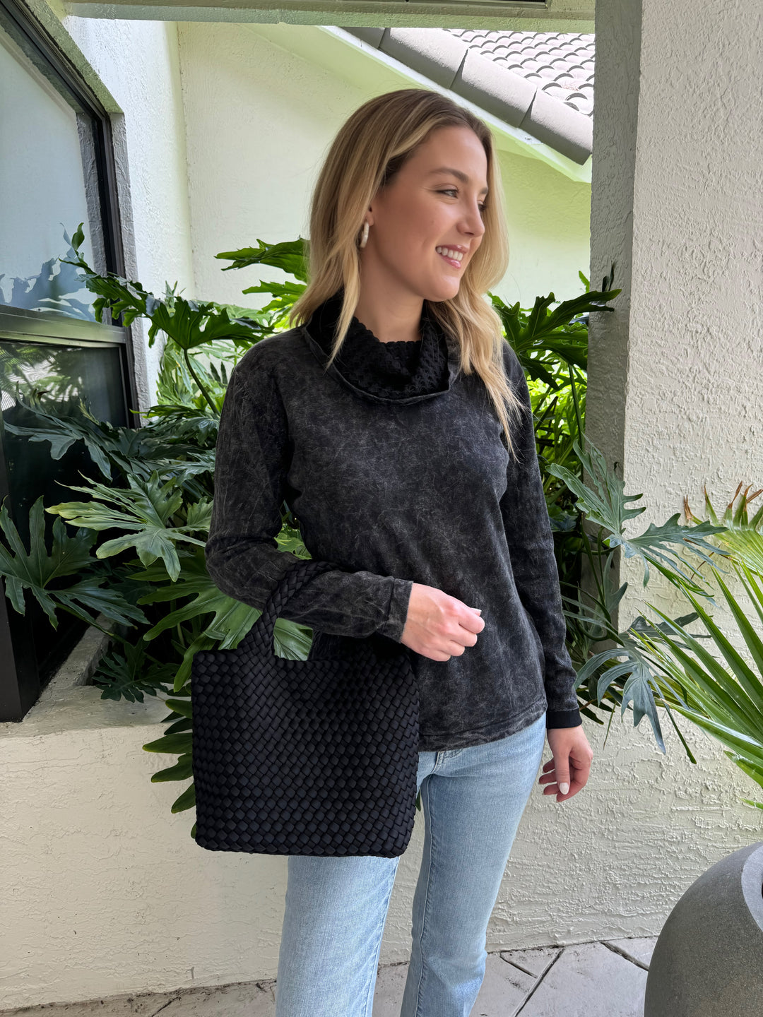 Barbara Katz Stone Wash With Mesh Sweater in Charcoal paired with Frame Le Easy Flare Raw Fray Jeans, and Sol and Selene Sy's The Limit Small Tote Bag in Black