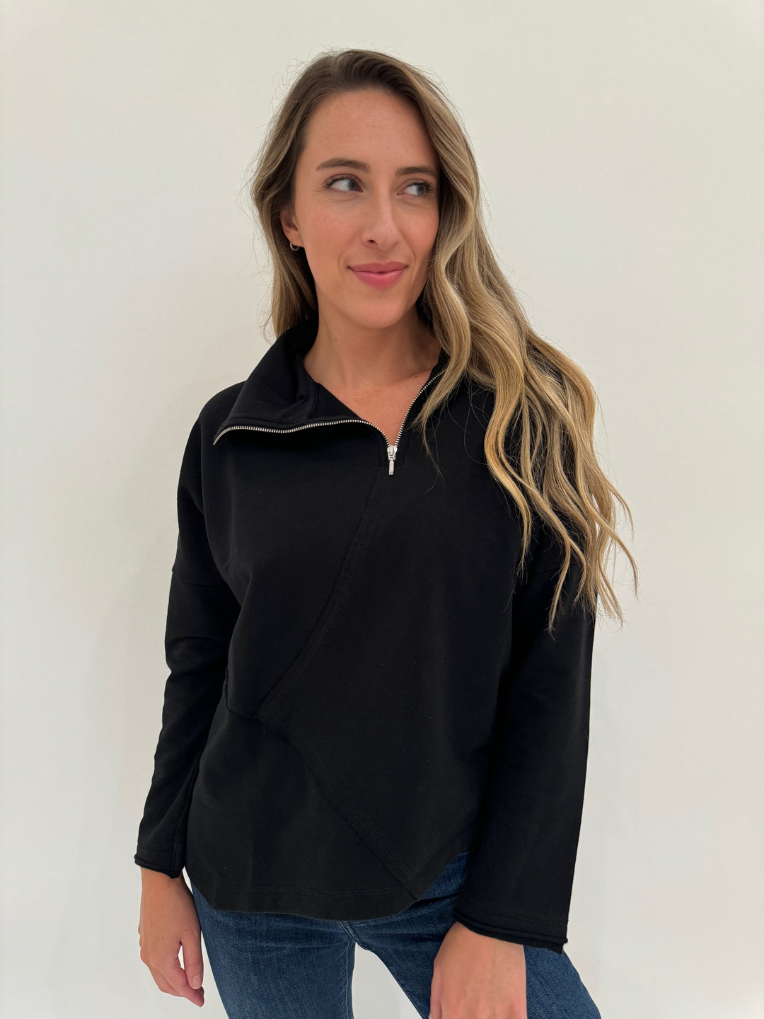 LIV by Habitat Zip Seam Pullover Sweater in Black available at Barbara Katz
