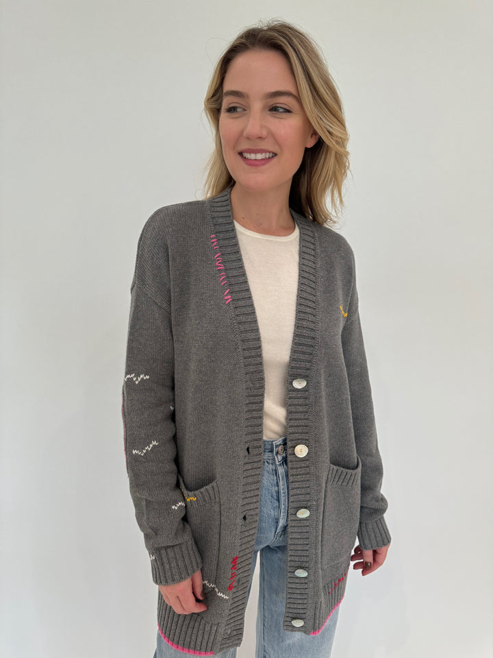 Kinross Cashmere Fitted Crew Sweater in Ivory layered with Kerri Rosenthal Smiley Poppy Cardigan in Gray available at Barbara Katz