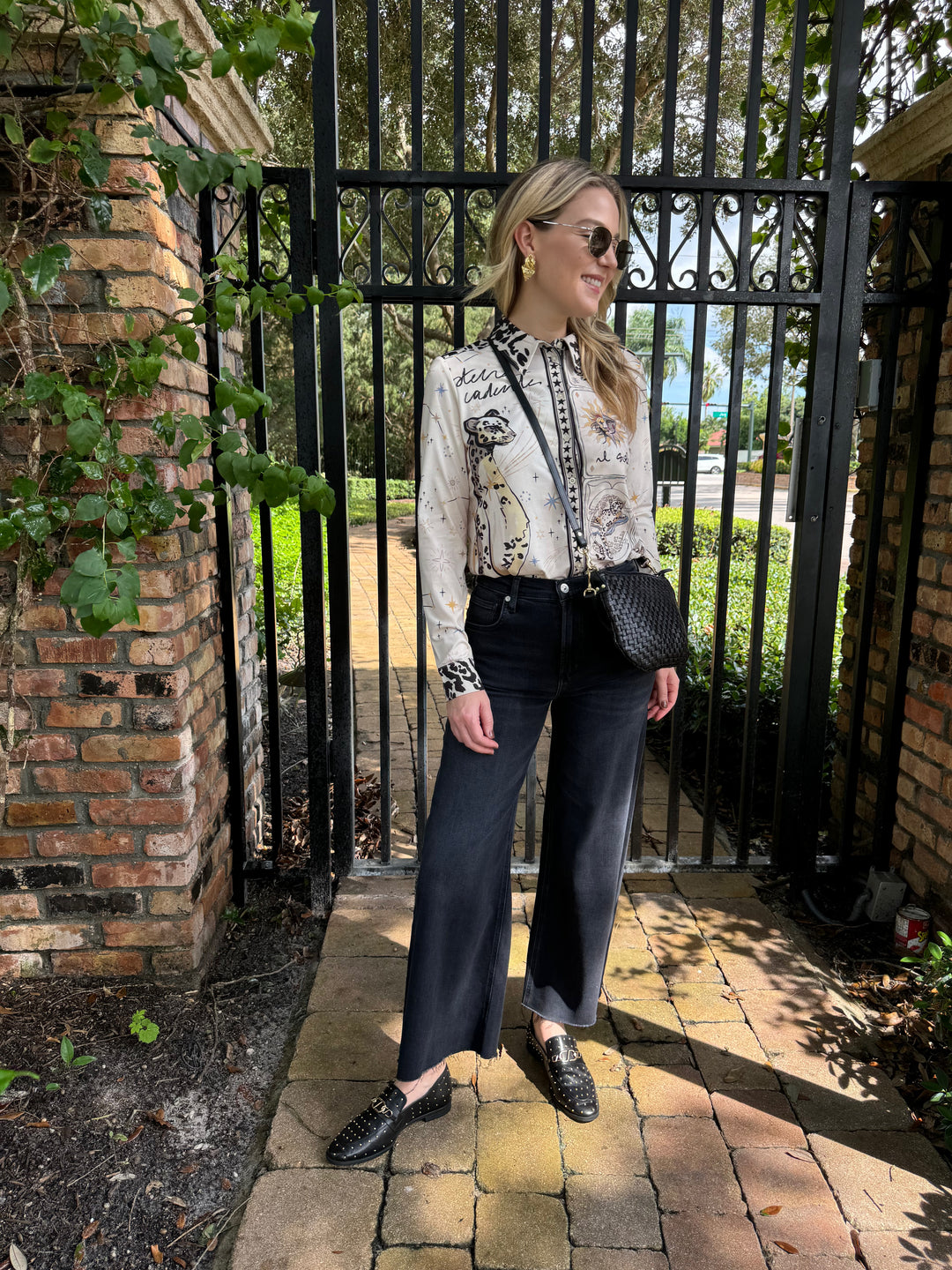 Oui Leopard Silky Long Sleeve Shirt Blouse paired with Citizens of Humanity Lyra Crop Wide Leg Denim Jeans in Medallion, Le Specs Neptune Deux Sunglasses, Clare V Petit Moyen Messenger Bag in Black Woven Checker - all available at Barbara Katz