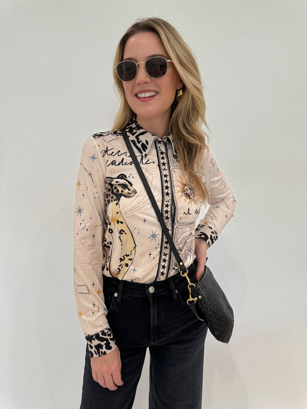 Oui Leopard Silky Shirt Blouse paired with Citizens of Humanity Lyra Crop Wide Leg Denim Jeans in Medallion, Le Specs Neptune Deux Sunglasses, Clare V Petit Moyen Messenger Bag in Black Woven Checker - all available at Barbara Katz