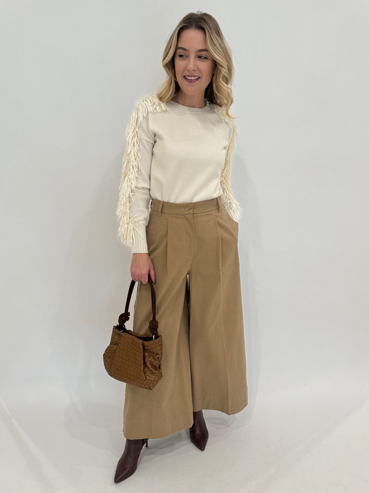 D.Exterior Fringe Sleeve Crew Sweater in Latte paired with Max Mara Weekend Caprile Button Side Pants in Beige and Daniella Lehavi Caramel Woven Bali Knotted Bag - all available at Barbara Katz