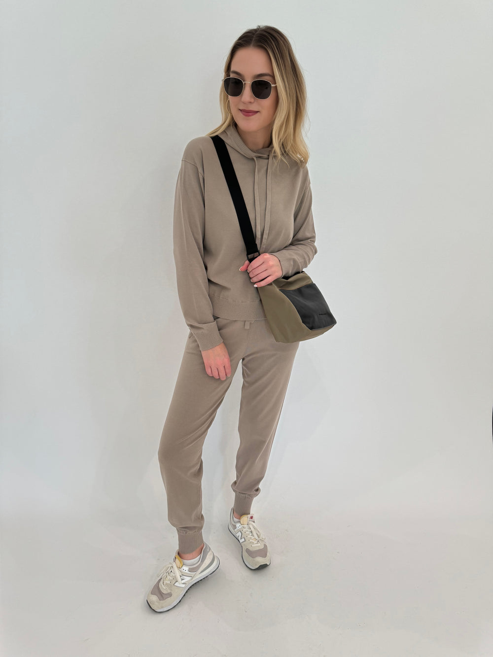 Max Mara Leisure Tesoro Sweatshirt in Turtledove paired with Pila Sweatpants and Daniella Lehavi Porto Small Crossbody Bag in Olive, Le Specs Neptune Sunglasses