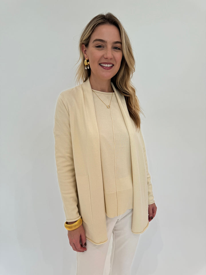 BK Olivia Long Open Cardigan in Ivory with Stella Roll Crew Neck Sweater underneath, BK Gold Cobra Bracelet, Alexis Bittar Asterales Necklace and Perla Freshwater Pearl Drop Hoops - all available at Barbara Katz