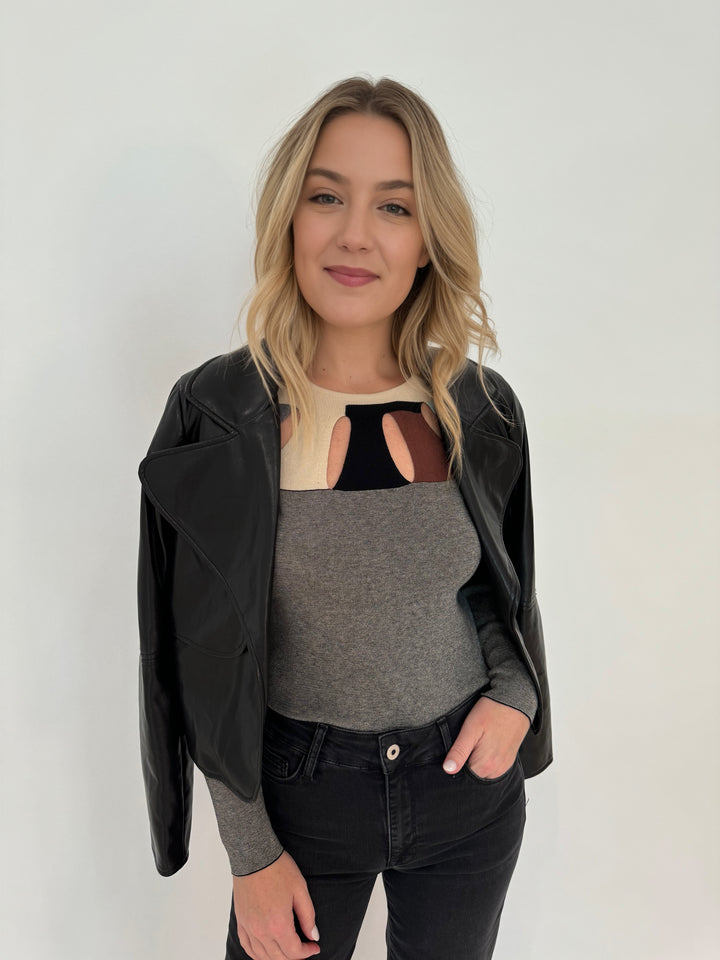 Adroit Atelier Ninon Vegan Leather Jacket in Black with Aldomartins Kamuk Top underneath, paired with Elliott Lauren Athena Wide Leg Jeans available at Barbara Katz