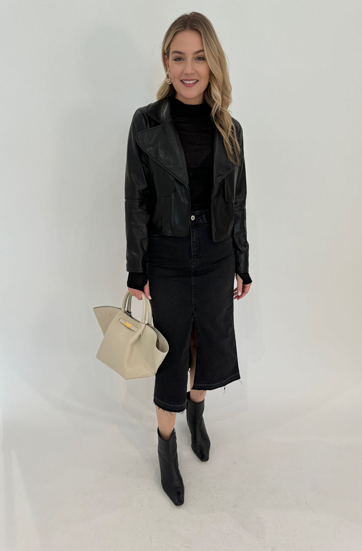 Elliott Lauren Geneva Jean Skirt With Front Slit in Black paired with Adroit Atelier Ninon Vegan Leather Jacket in Black available at Barbara Katz