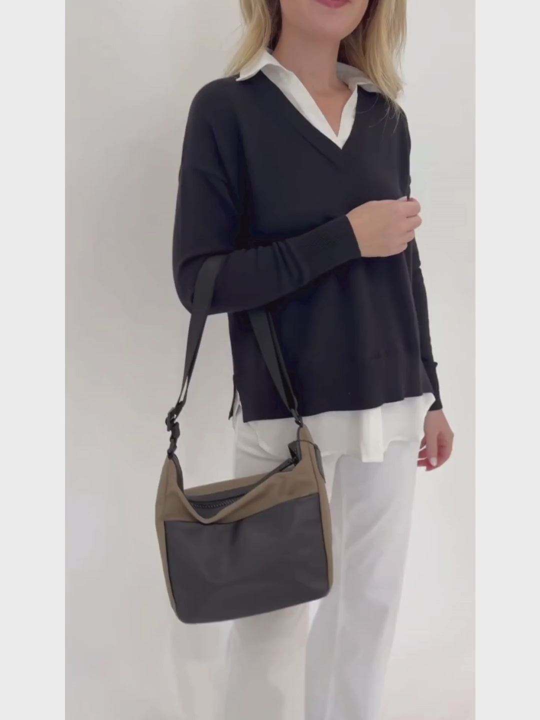 Elliott Lauren Double Layer V-Neck Sweater With Shirting in Black paired with Enza Costa Twill Everywhere Pant in Off White, Daniella Lehavi Porto Small Crossbody Bag in Olive/Black