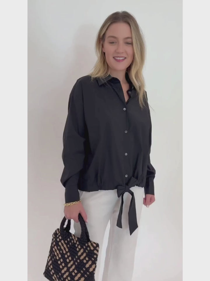 Repeat Tie Waistband Long Sleeve Blouse in Black paired with Enza Costa Twill Everywhere Pant in Off White and Sol and Selene Sky's The Limit Small Bag in Black/Nude