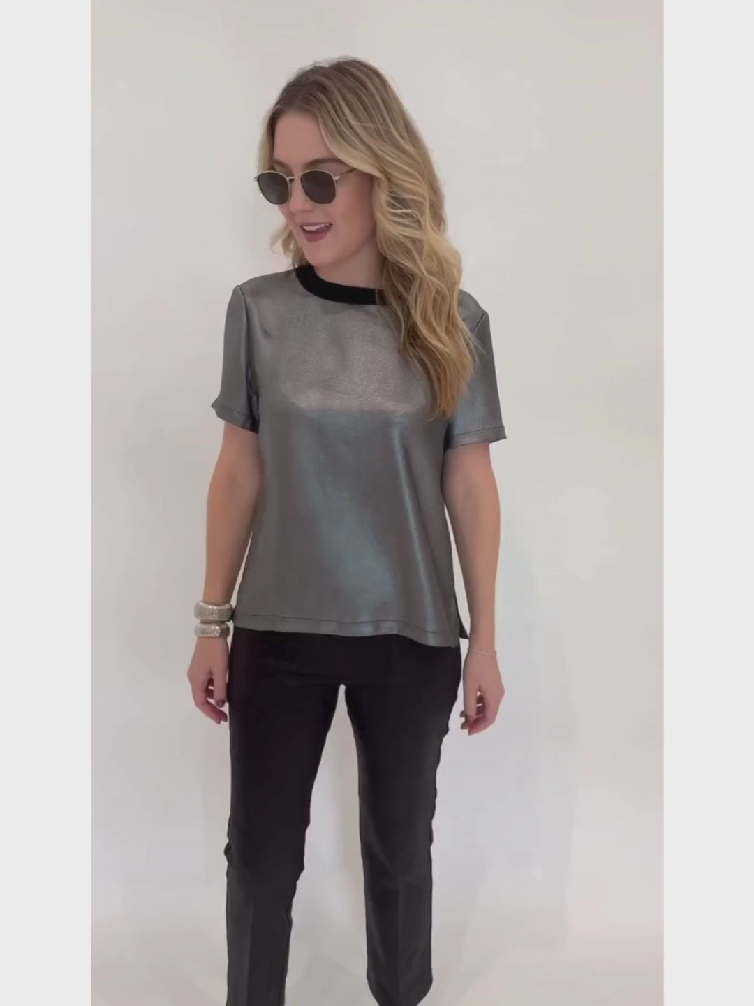 Elliott Lauren Slinky Metallic Tee in Silver paired with Black Lava Pants With Patch Pocket, BK Silver Cobra Cuff and Bracelet, Le Specs Neptune Deux Sunglasses - all available at Barbara Katz